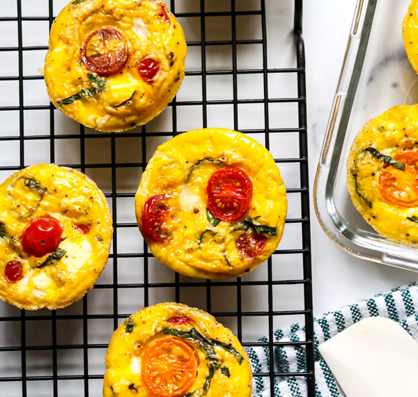 3-ingredient baked feta & cherry tomato egg muffins