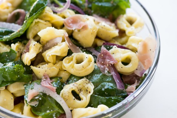 3-ingredient pasta salad: tortellini + baby spinach + prosciutto + red onions