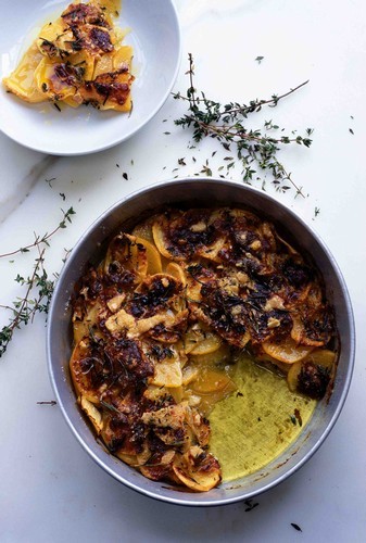 A baked cake of swede and potato