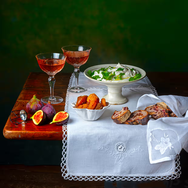 A bowl of ricotta, herbs, spiced figs and apricots