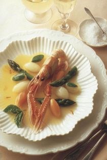 A light stew of Dublin Bay prawns and asparagus in a saffron soup