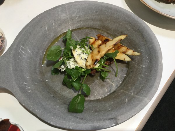 A salad of Crozier blue cheese with ripe pears and spicy candied nuts