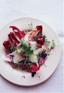 A salad of pears and cheese with sprouted seeds
