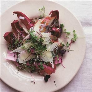A salad of pears and cheese with sprouted seeds