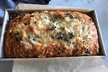 A savory loaf packed with cheese and olives