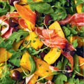 A warm salad of roasted pumpkin, prosciutto and chestnuts
