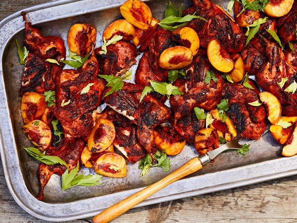 Achiote-marinated quail with grilled peaches
