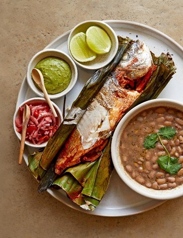 Achiote-marinated sea bream cooked in banana leaves (Tikin xic)