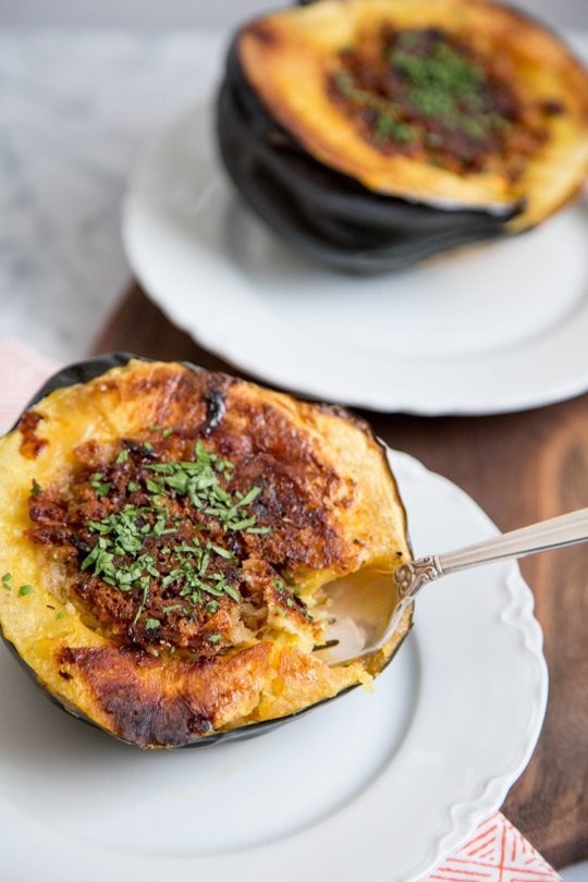 Acorn squash stuffed with bread, cheese, and bacon