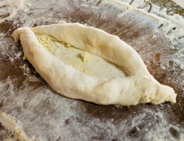 Adjarian khachapuri (Adjaruli khachapuri)