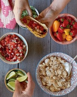 Adobo chicken tacos with pico de gallo and grilled corn