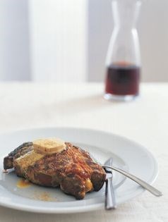 Aged beef ribs barbecued with anchovy butter