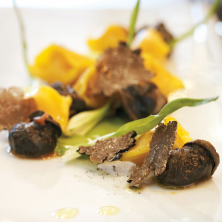 Agnolotti di Langa with snail confit, puntarella & black truffle