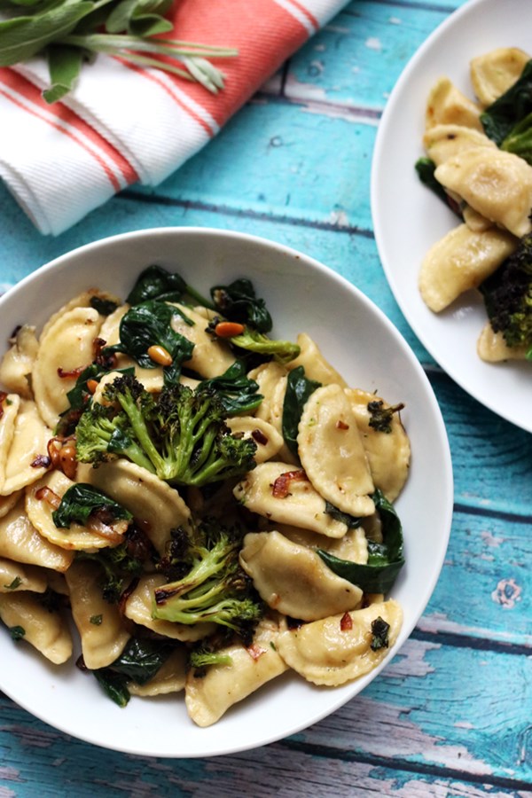 Agnolotti with roasted broccoli and spinach in a buttered pine nut sauce