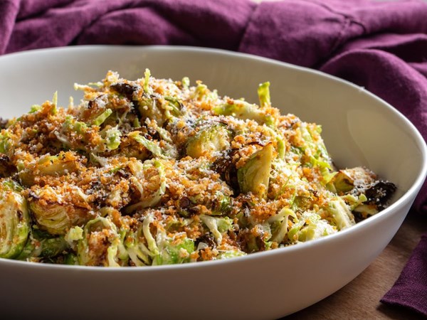 Air-fryer Brussels sprouts with preserved lemon–Caesar dressing