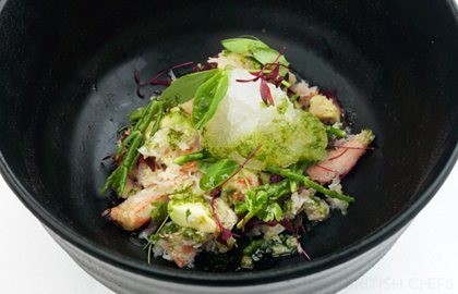 Alaska king crab with microherb salad and tomato consommé granita