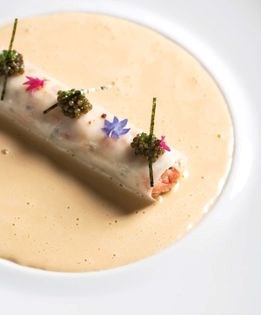 Alaskan king crab "cannelloni" with sea urchin coulis