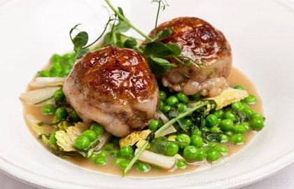 Ale-braised mutton and kidney faggots with peas, lettuce and mint