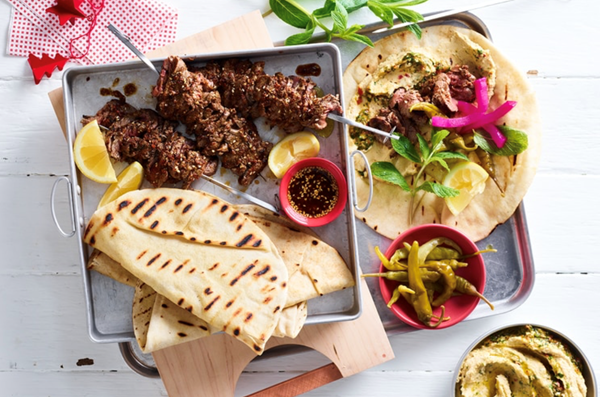 Aleppo pepper beef kebabs with chilli and coriander hummus