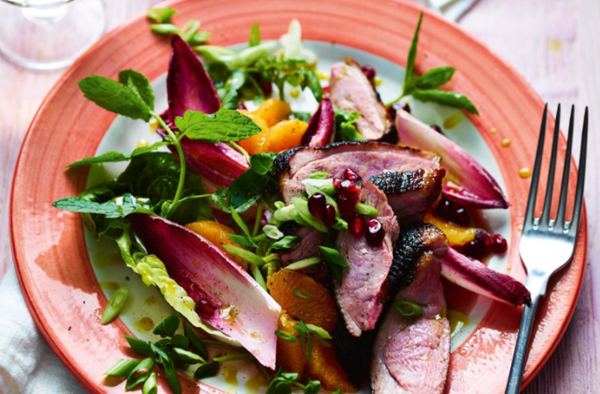 Allspice honey duck with chicory, orange & pomegranate salad