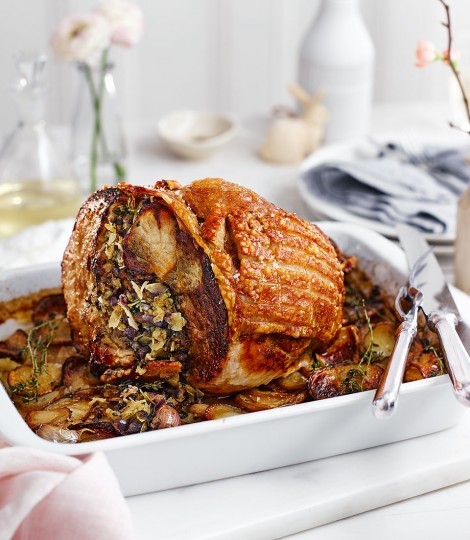Almond and herb stuffed leg of pork with confit potatoes, apples and Madeira