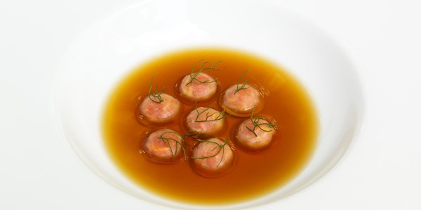 Almond and 'nduja bottoni with potato broth