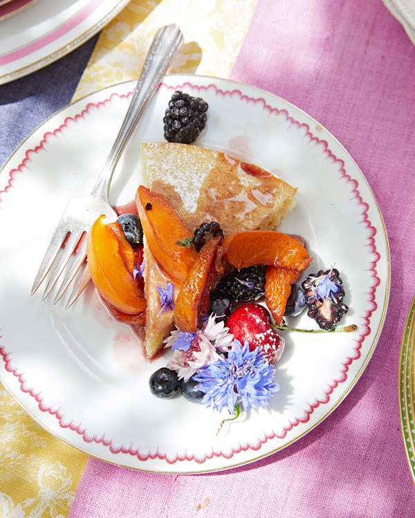 Almond cake with fruit and rosé drizzle