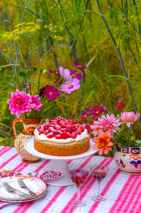 Almond cake with sherry cream and raspberries