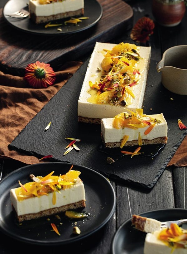 Almond cheesecake with orange syrup