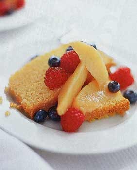 Almond cornmeal cake with peach and berry compote