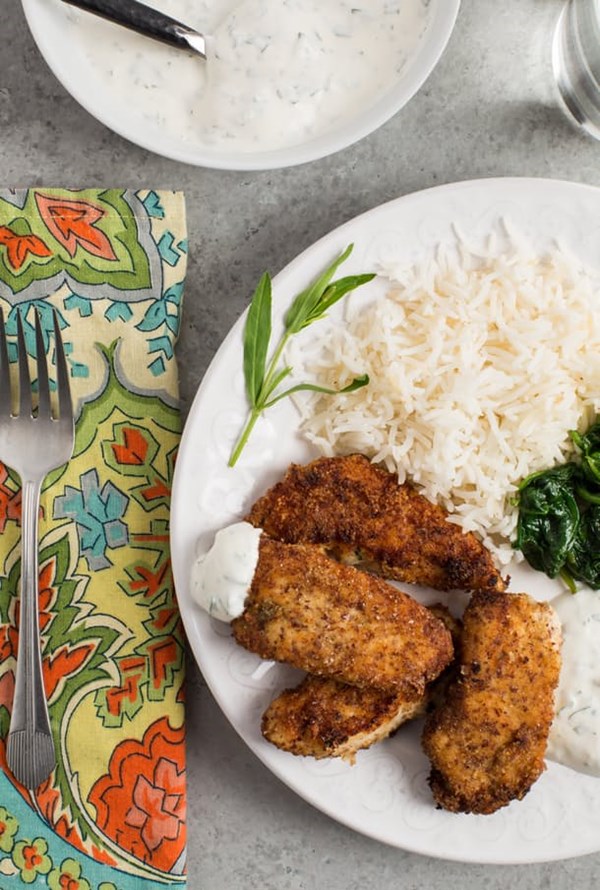 Almond-crusted chicken fingers with yogurt-herb dip