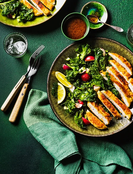 Almond crusted chicken with marinated kale and sumac salad
