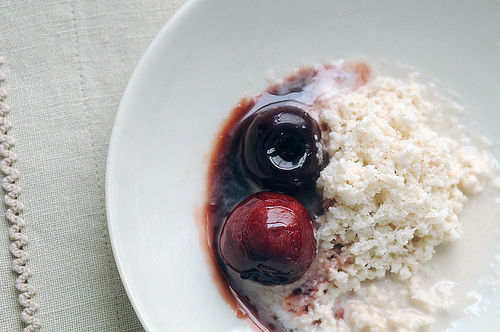 Almond ice with glazed cherries