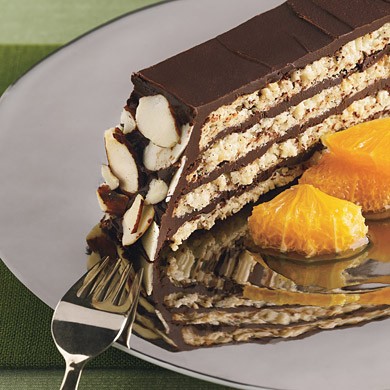 Almond-macaroon torte with chocolate frosting and orange compote