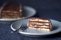 Almond macaroon torte with chocolate frosting