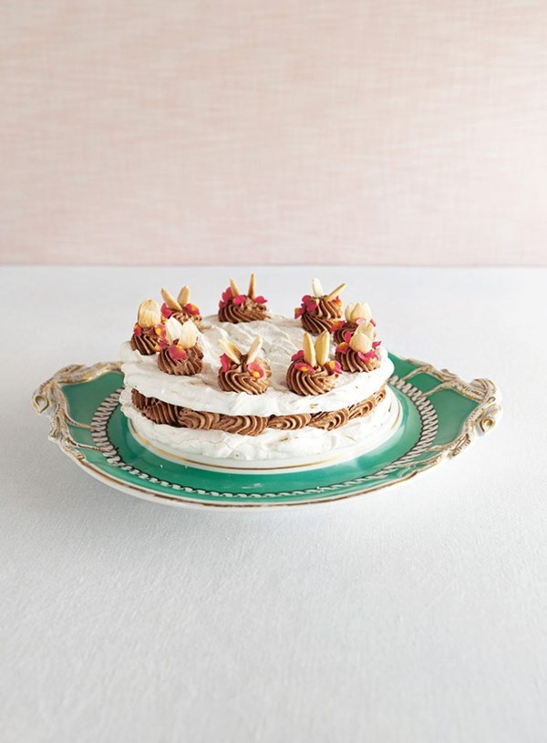 Almond meringue gâteau with chocolate and rum cream