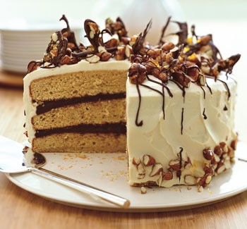 Almond praline cake with mascarpone frosting and chocolate bark