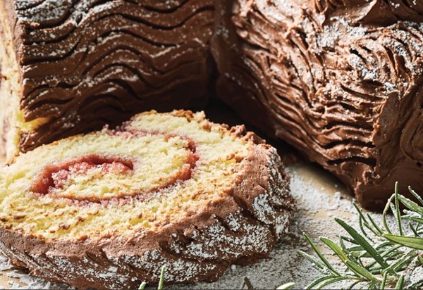 Almond-raspberry bûche de Noël with chocolate frosting