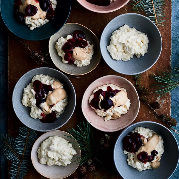 Almond rice pudding with sweet cherry sauce and caramel cream