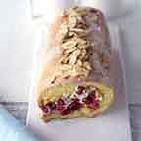 Almond roulade with raspberries and cream