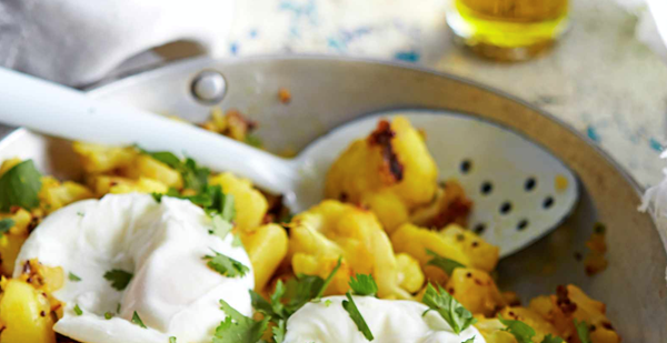 Aloo gobi and poached eggs