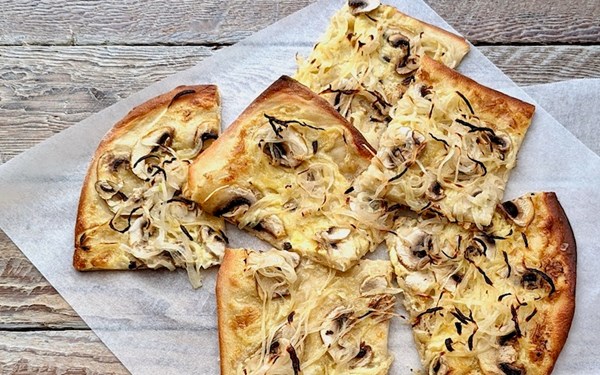 Alsatian flatbread with mushrooms (Tarte flambée forestière)