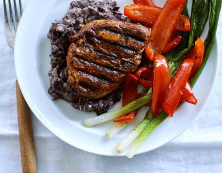 Ancho chicken breast with black beans, bell peppers & scallions