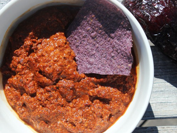 Ancho-chipotle salsa with chocolate and fried almonds