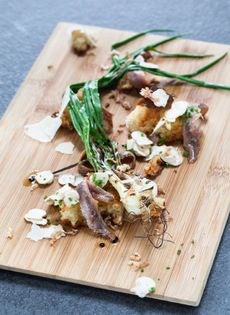 Anchovies, grilled onions, sourdough bread, pata negra ham, and mushrooms