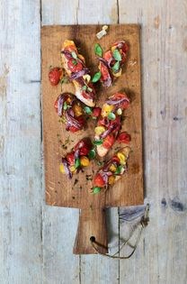 Anchovies with tomato confit on toast