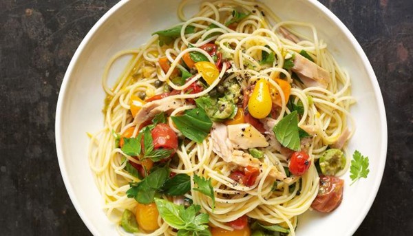 Angel hair pasta with flash-sautéed fresh cherry tomato sauce, tuna, and green olives