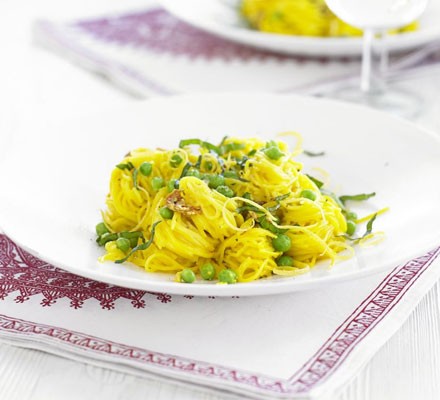 Angel hair pasta with saffron, prosciutto and peas