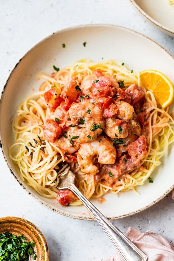 Angel hair pasta with shrimp and tomato cream sauce