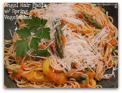 Angel hair pasta with spring vegetable and red pepper tomato sauce